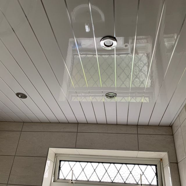White And Silver Strip Ceiling Panel With SpotLights