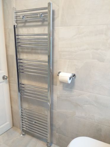 500 x 1600 C/P Towel Warmer. Dubai Blue 32 x 62.5 Wall Tiles. Genoa Solid Brass C/P Toilet Roll Holder